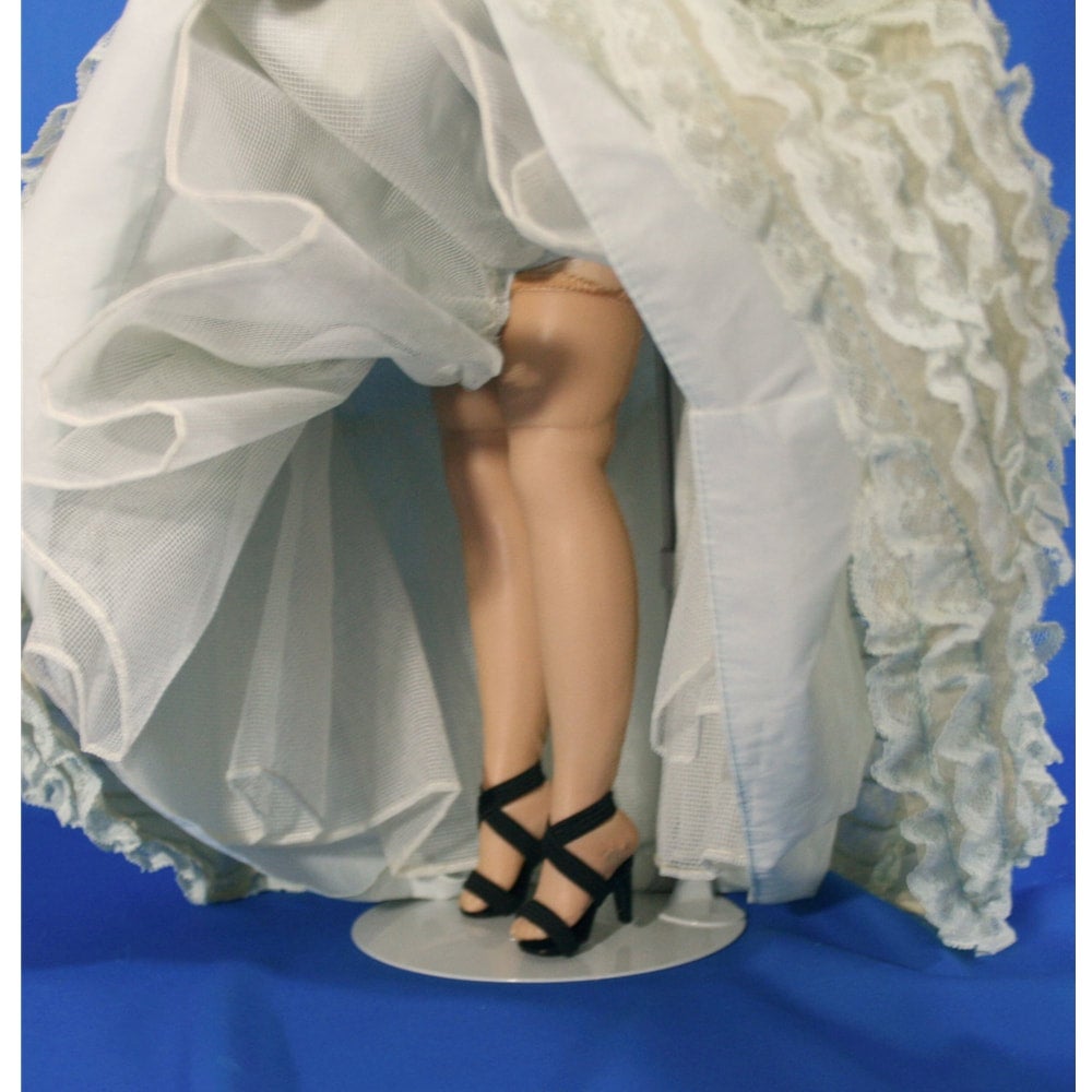 Madame Alexander Elise doll wearing Blue Ruffled Ballgown