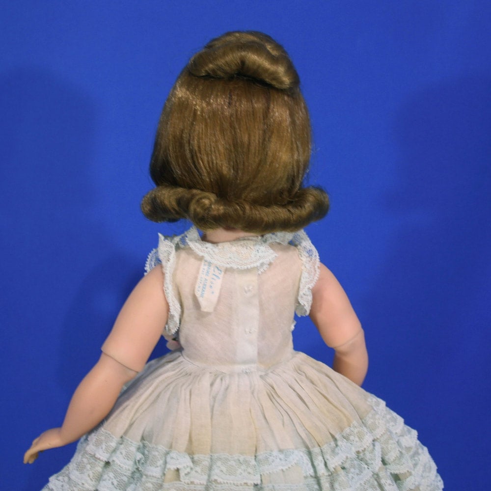 Madame Alexander Elise doll wearing Blue Ruffled Ballgown