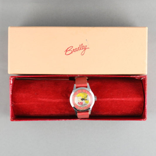 Bradley Barbie 1963 Jewelry Watch Coral background with Blond Ponytail