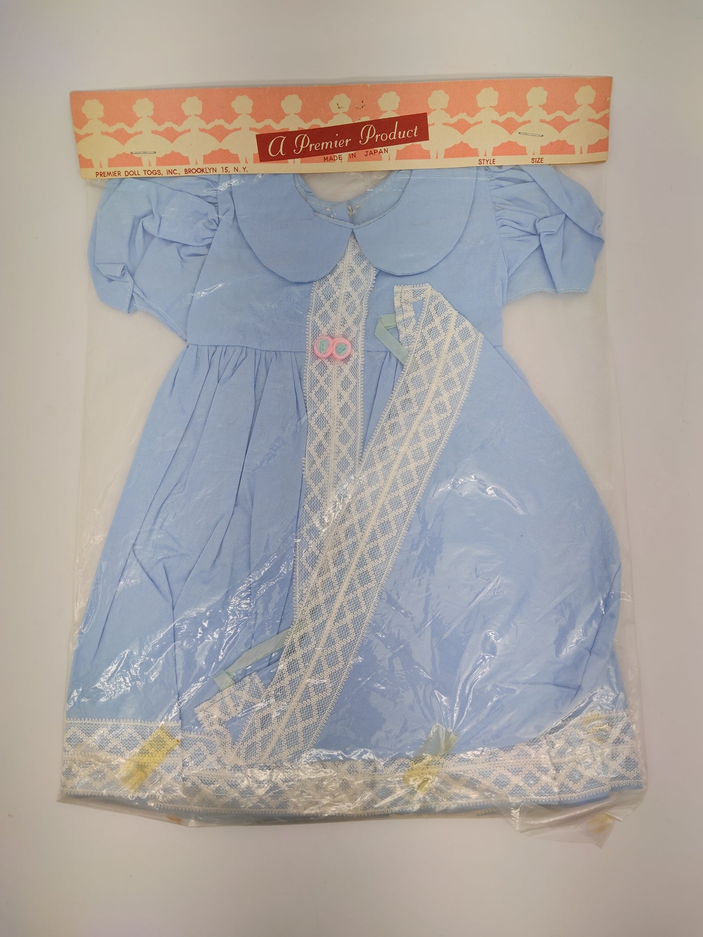 Premiere Company Dress and Bonnet with white lace and 2 flowers? at waist