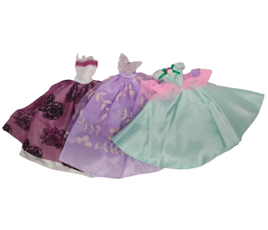 Trio of Handmade Barbie Dresses most likely from Walmart sewing kit
